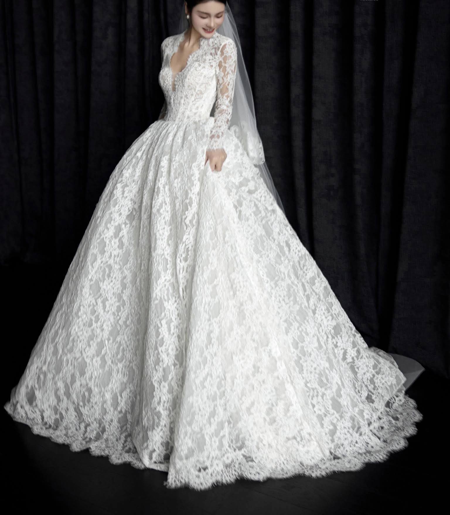 Long Sleeve Lace Ball Gown Wedding Dress – Deep V-Neck Bridal Look