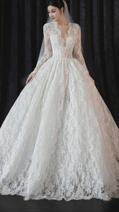 Long Sleeve Lace Ball Gown Wedding Dress – Deep V-Neck Bridal Look
