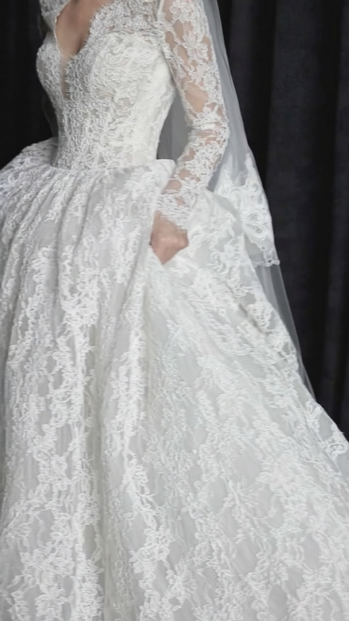 Long Sleeve Lace Ball Gown Wedding Dress – Deep V-Neck Bridal Look